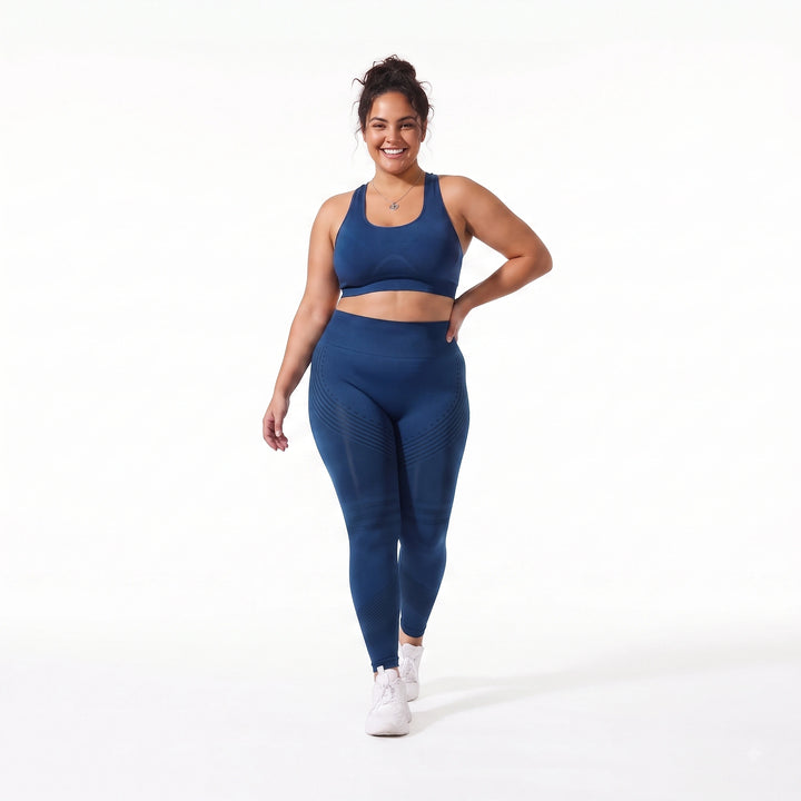 Vista frontal de mallas moldeadoras azul zafiro para mujer, mostrando un ajuste perfecto y control de abdomen para uso diario